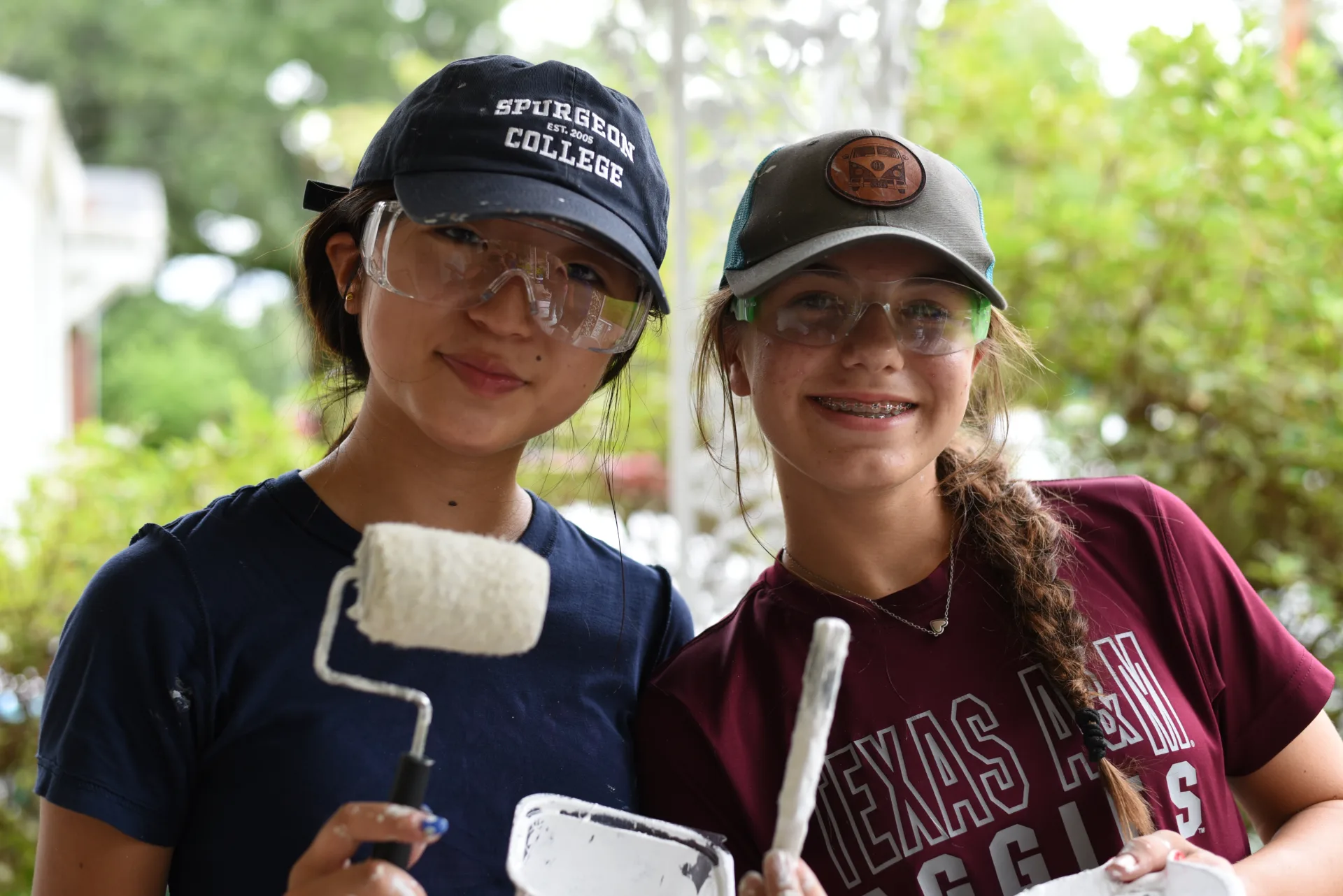 Students painting with rollers