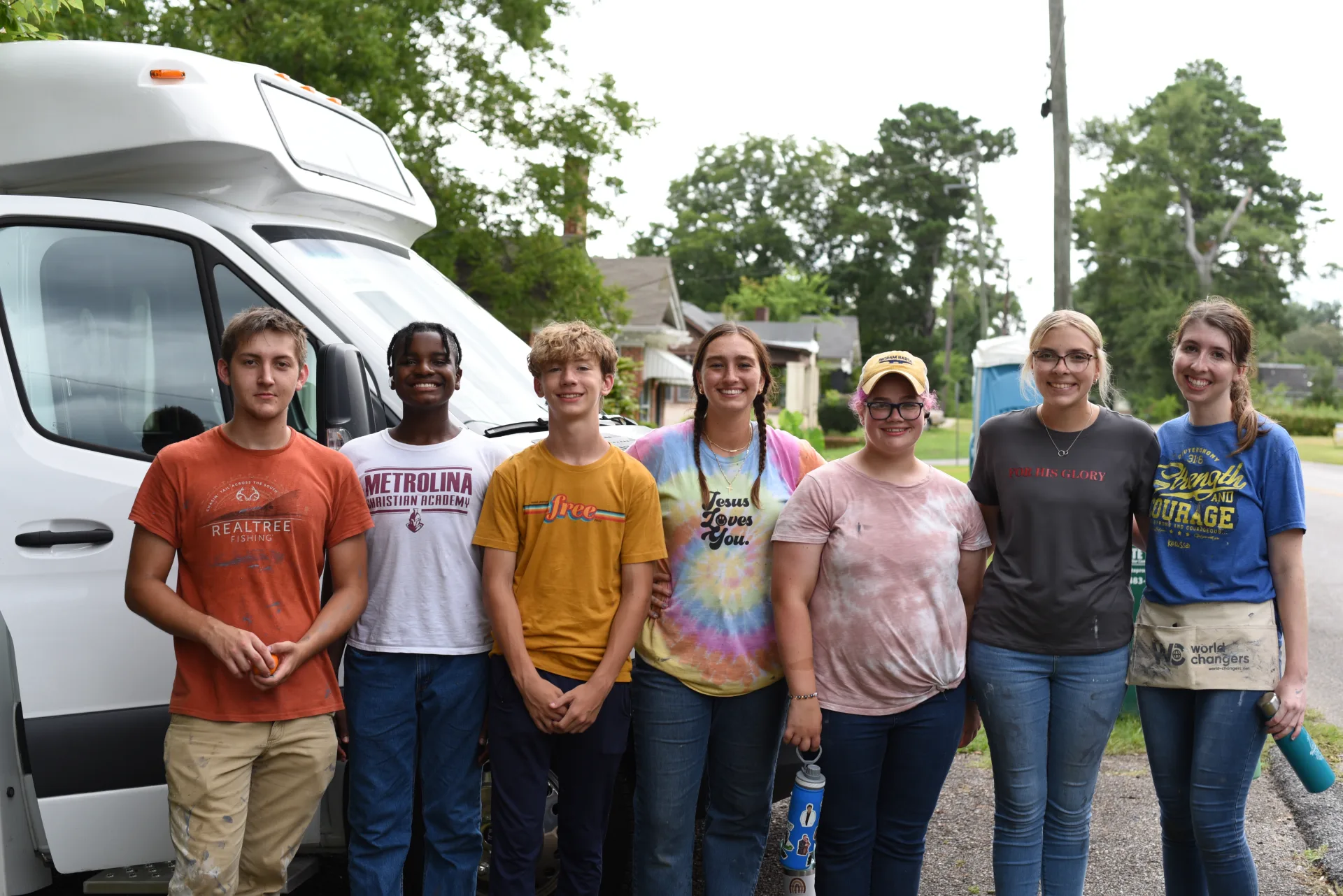 Student crew next to World Changers van
